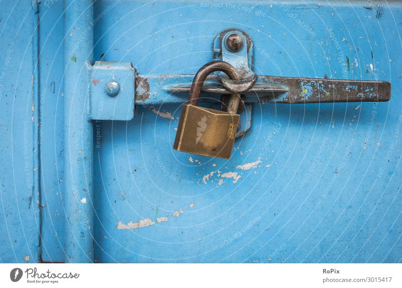Padlock on a blue container. Design Work and employment Workplace Economy Industry Trade Logistics Craft (trade) Company Technology Science & Research Art