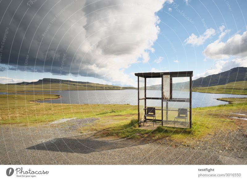 bus stops at the lake Environment Landscape Plant Animal Water Climate Hill Mountain Lakeside Wait Clouds Stop (public transport) Chair Protection Shelter Bus