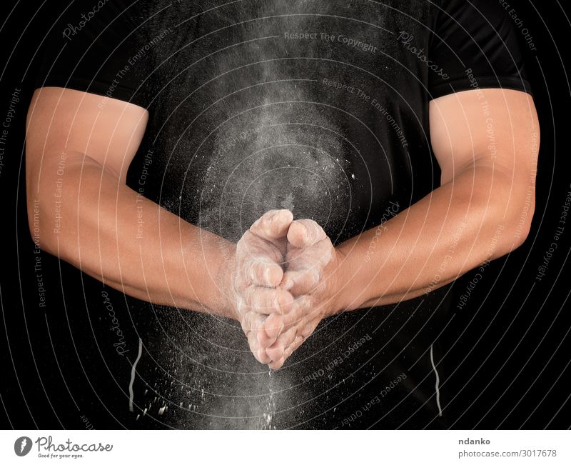 athlete in black clothes clapping, white talc magnesium fly away Fitness Sports Sportsperson Human being Man Adults Hand Muscular Strong Black Power Powder