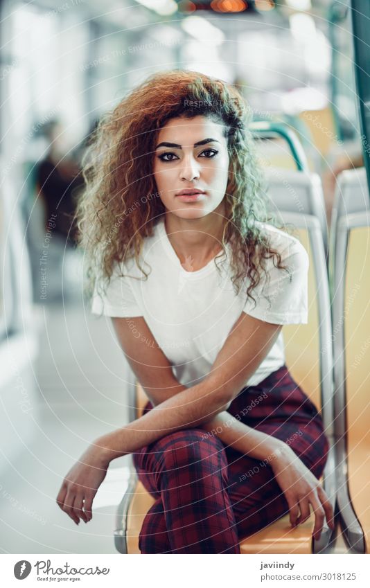 Arab woman inside metro train. Arab girl in casual clothes. Lifestyle Beautiful Hair and hairstyles Vacation & Travel Tourism Trip Human being Feminine