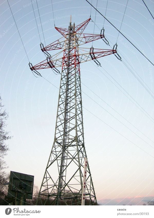 Electric colossus. Electricity Electricity pylon Transmission lines Railroad crossing Steel Industry Energy industry