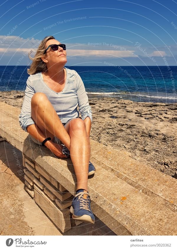 Day at the sea Spain Majorca Woman Female senior 60+ Ocean Coast Promenade Sun Wind Dream To enjoy Leisure and hobbies Freedom Horizon Wall (barrier) Stone wall