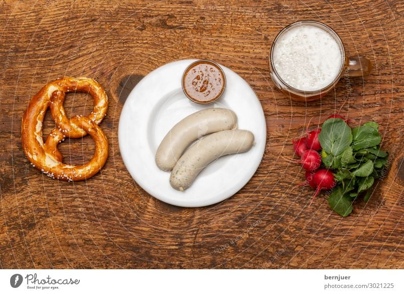 Bavarian veal sausage with pretzel Sausage Vegetable Breakfast Lunch Beverage Alcoholic drinks Beer Plate Table Oktoberfest Culture Wood Red White Tradition