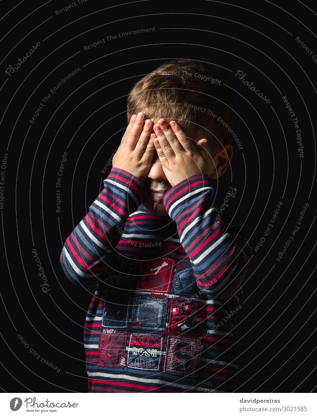 Scared Young Boy with Hands on His Face Stock Photo - Image of