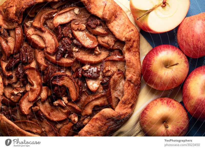Homemade apple pie with pecan nuts. Autumn dessert Food Apple Cake Dessert Warmth Fresh Delicious Many Gold Tradition Thanksgiving day above view Apple pie