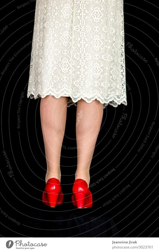 Stylish Woman Wearing White Dress and High Heels Shoes on White