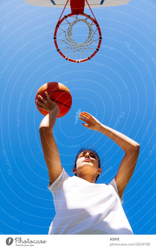 Girl playing basketball in a sunny day Lifestyle Joy Beautiful Playing Summer Sports Woman Adults Youth (Young adults) Sky Park Jump Cute Competition girl