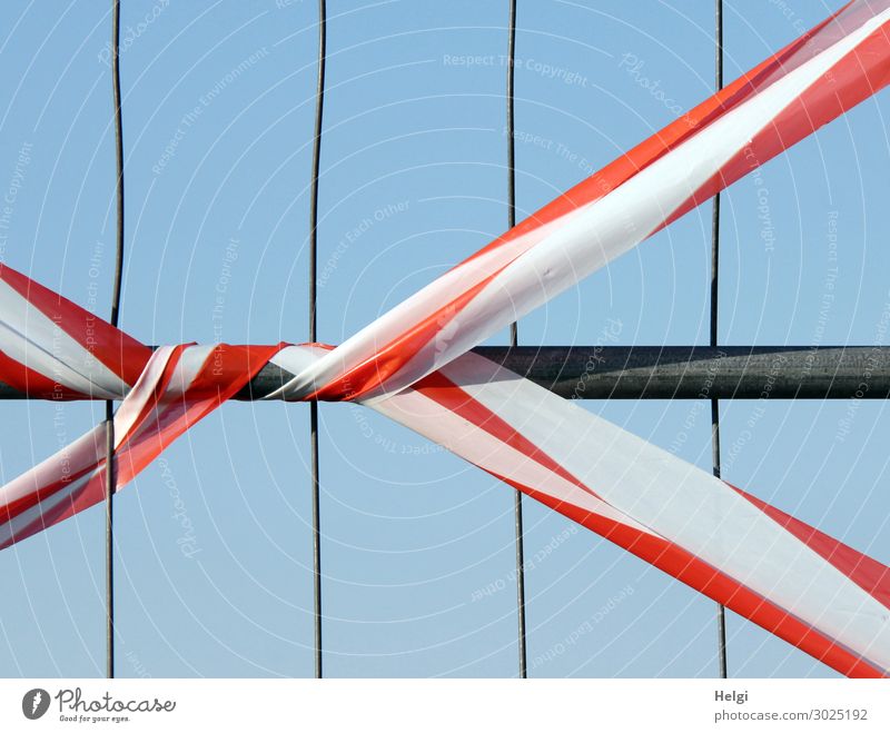 red-white barrier tape on a fence Cloudless sky Fence Protective Grating Barrier Metal Plastic Line String To hold on Stand Authentic Exceptional Simple