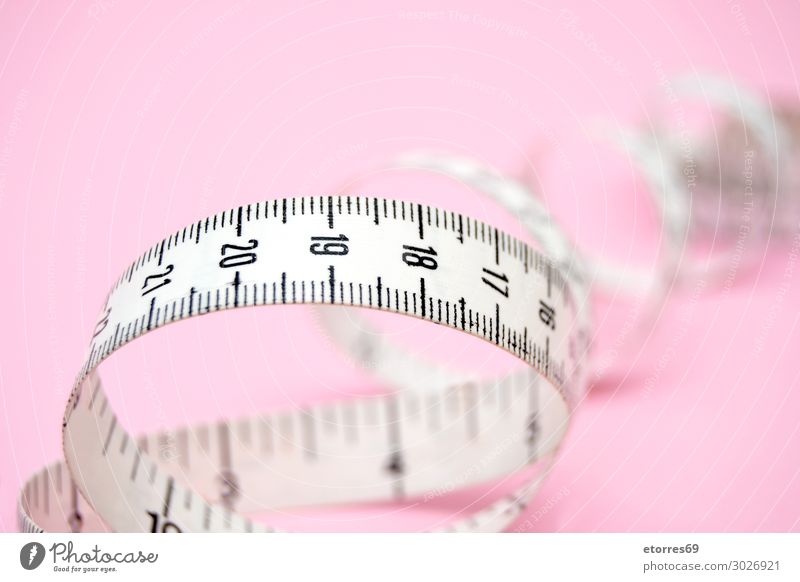 Pink Measuring Tape Isolated On White Background Stock Photo, Picture and  Royalty Free Image. Image 61847596.