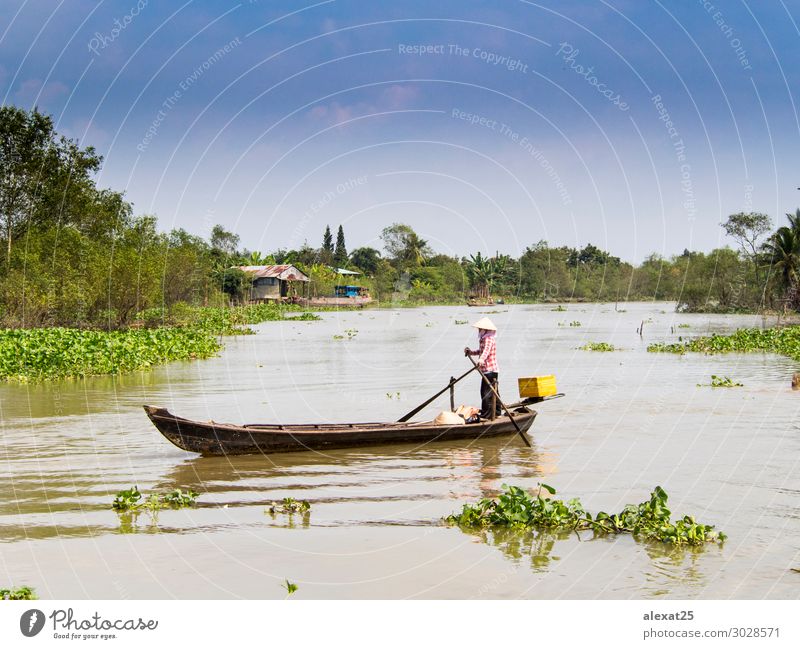 Boat sailing through the mekong delta Beautiful Vacation & Travel House (Residential Structure) Nature River Village Watercraft Green Asia asian colorful East