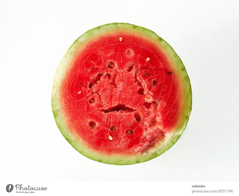 half ripe red watermelon with brown seeds Fruit Dessert Nutrition Vegetarian diet Diet Eating Fresh Delicious Natural Juicy Green Red White anove Water melon