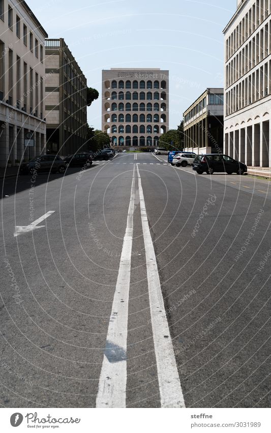 on the road | on the road again Town Facade Italy Rome World exposition Modern architecture Street Palazzo della Civiltà Italiana Transport Symmetry