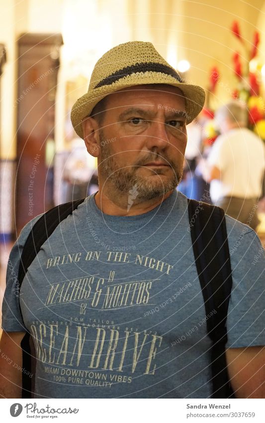 Tourist in Havana Masculine Man Adults Father 1 Human being 45 - 60 years Fashion T-shirt Hat Facial hair Designer stubble Beard Observe Going Stand Athletic