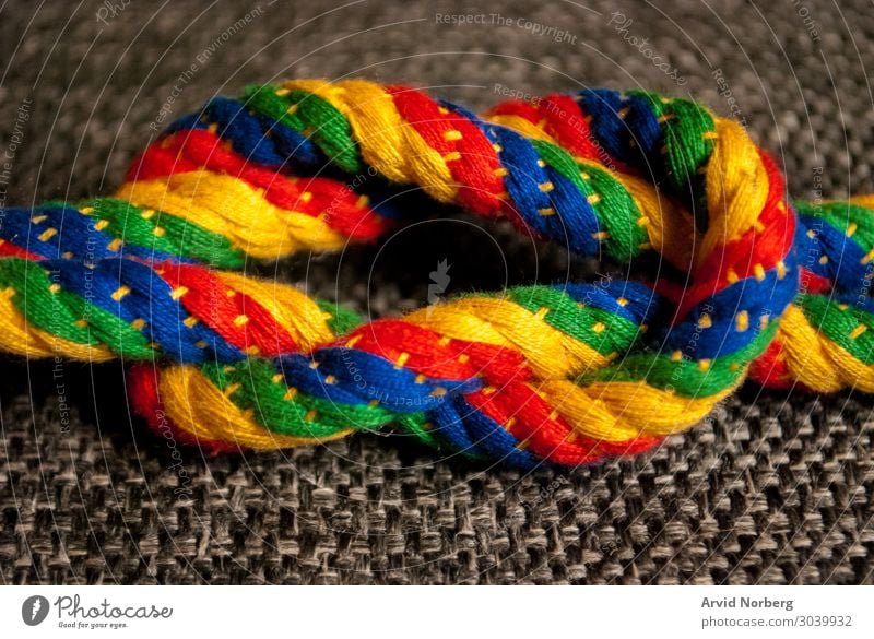 https://www.photocase.com/photos/3039932-a-rainbow-colored-knot-joy-beautiful-handicraft-photocase-stock-photo-large.jpeg