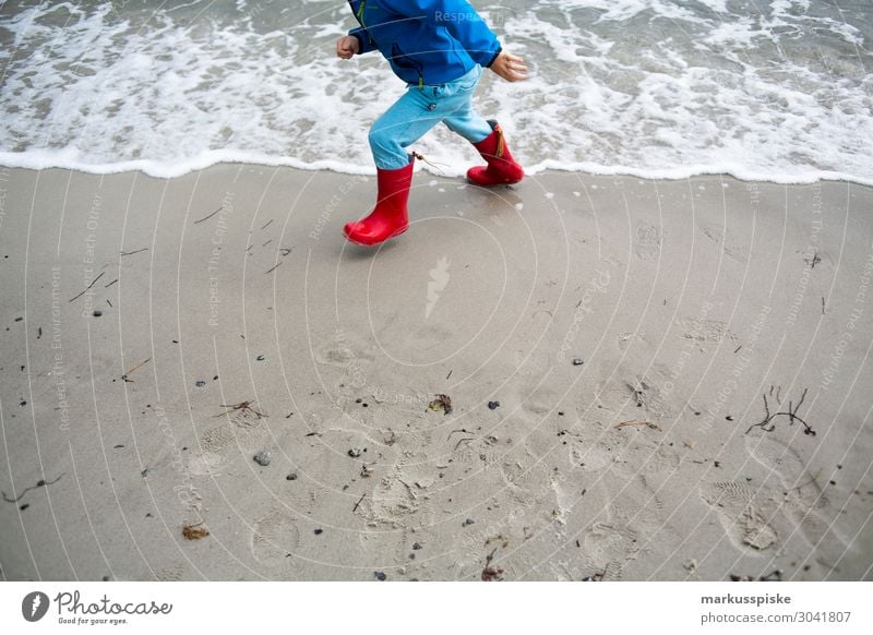 beach games baltic sea rubber boots child Playing Vacation & Travel Tourism Trip Adventure Far-off places Freedom Expedition Camping Beach Ocean Waves