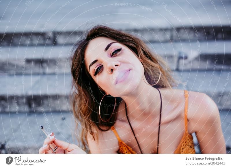 Beautiful caucasian woman smoking cigarette.Urban lifestyle Lifestyle Style Happy Leisure and hobbies Freedom Summer Feminine Young woman Youth (Young adults)