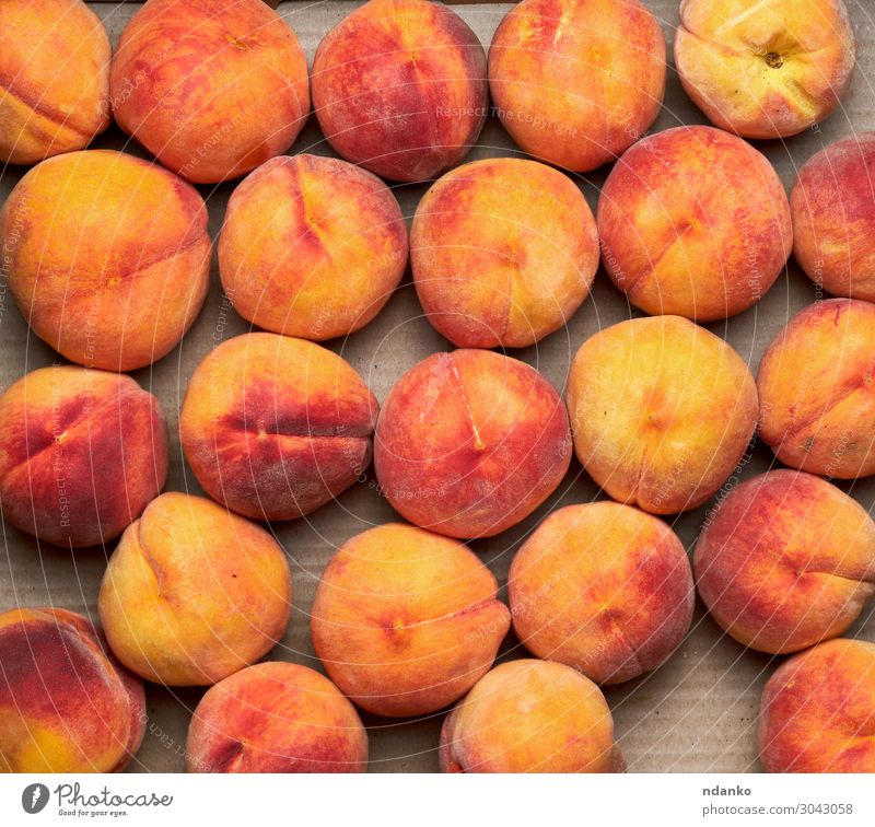 ripe yellow-red round peaches lie in a row Fruit Dessert Nutrition Vegetarian diet Diet Juice Summer Nature Eating Fresh Delicious Natural Juicy Soft Yellow Red