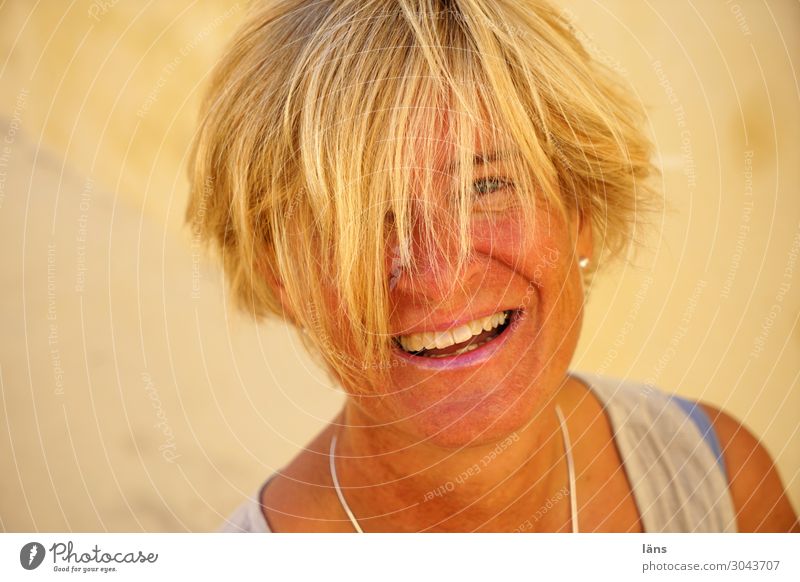 cheerful woman Human being Feminine Life Head 1 45 - 60 years Adults Wall (barrier) Wall (building) Blonde Short-haired Observe Smiling Laughter Emotions Joy