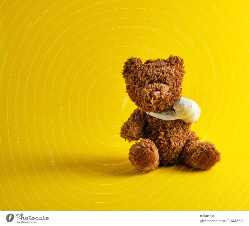 brown teddy bear with a bandaged paw sitting Joy Medical treatment Illness Medication Child Hospital Infancy Toys Doll Teddy bear Sit Small Funny Cute Soft