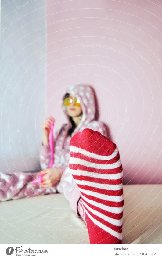 striped sock wearer teenager Youth (Young adults) Young woman youthful Infancy Goofy Crazy Daft Joy Brash Pink Striped Bed Cozy Playing Sunglasses Pyjama