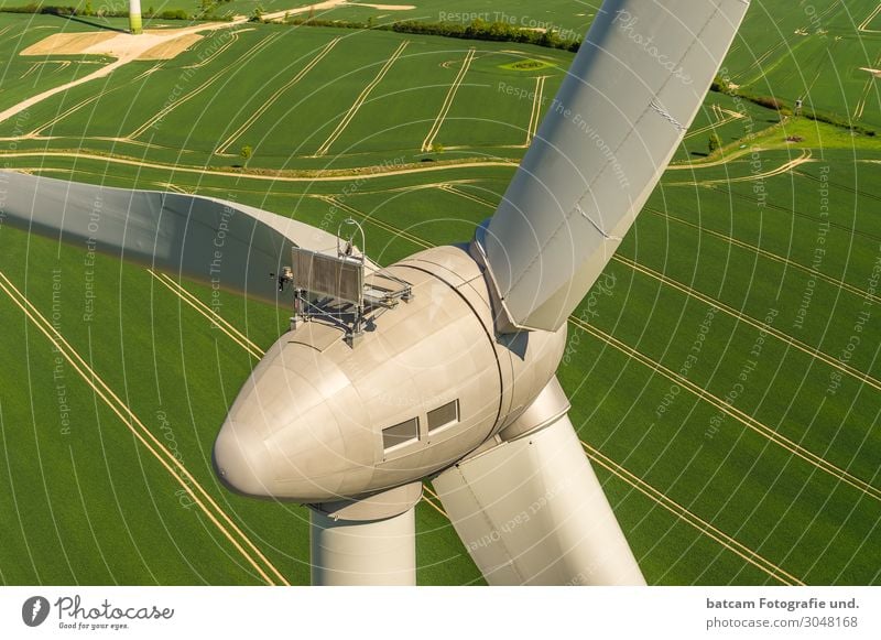 Wind turbine aerial view on green field Machinery Technology Energy industry Renewable energy Wind energy plant Modern Yellow Gray Green Windmill Enercon