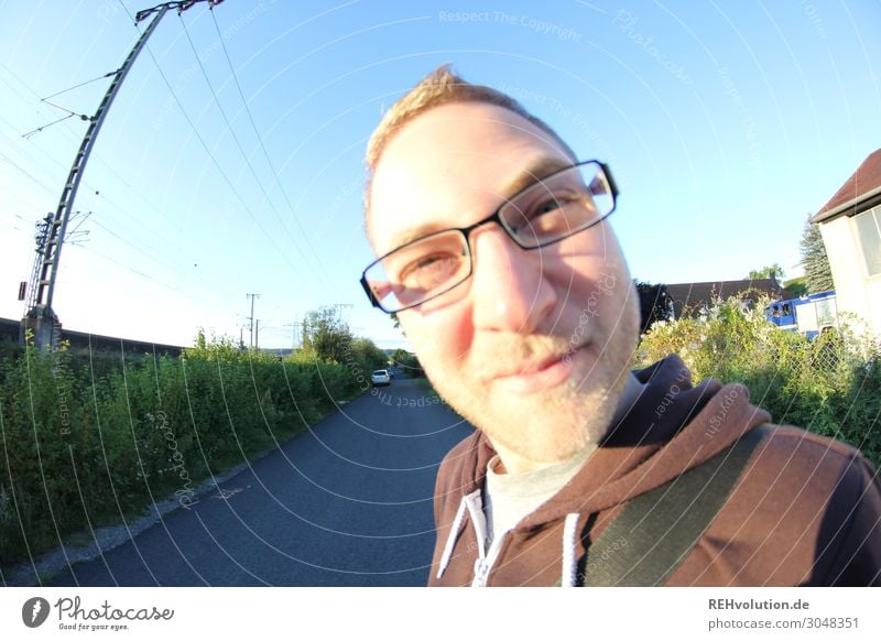 Fisheye young man with glasses outside Lifestyle Leisure and hobbies Human being Masculine Young man Youth (Young adults) Man Adults Face 1 18 - 30 years