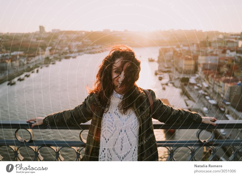 Young beautiful woman enjoying in the bridge of Porto Lifestyle Happy Beautiful Vacation & Travel Tourism Summer Sun Human being Woman Adults River Skyline