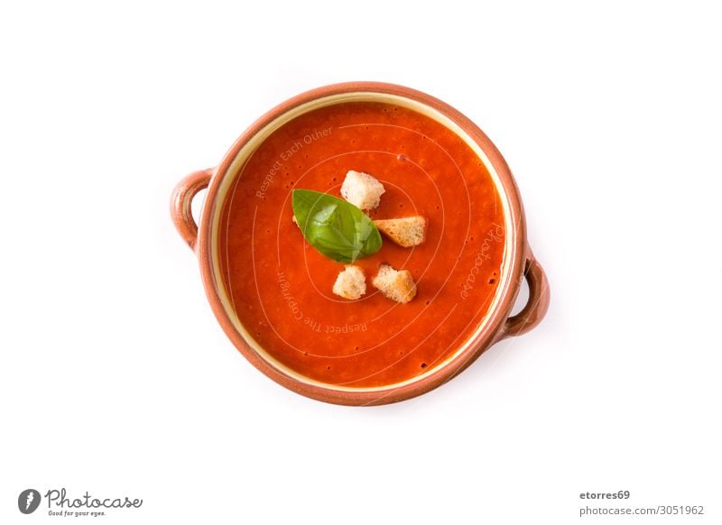Tomato soup in brown bowl isolated on white background. Soup Food Healthy Eating Food photograph Bread Basil Red Vegetable Brown Bowl Vegetarian diet Cream