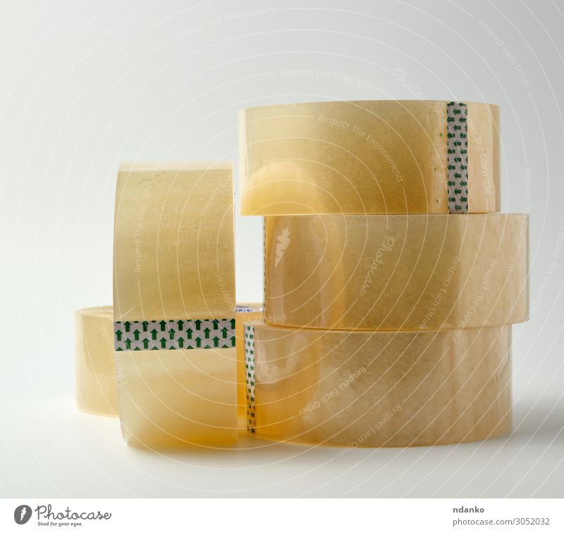 stack of transparent adhesive tape Office Tool Packaging Plastic Yellow White Material equipment Bobbin sellotape background Adhesive Object photography circle