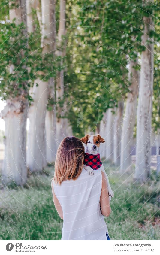 young beautiful woman holding her cute small dog on shoulder Lifestyle Beautiful Harmonious Leisure and hobbies Vacation & Travel Summer Feminine Young woman