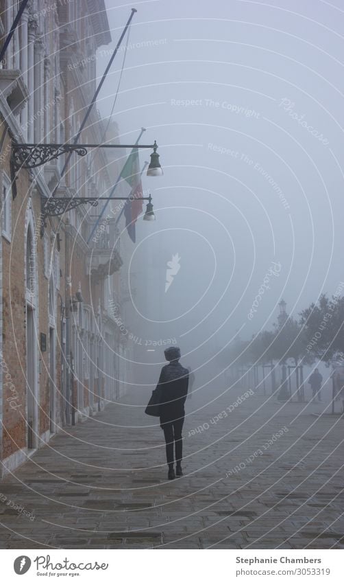 Woman walking through Venice 1 Human being Wanderlust Italy wander Loneliness misty Mysterious atmospheric Colour photo Exterior shot Day Looking away