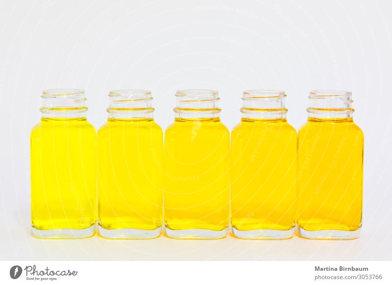 Download Different Shades Of Yellow Fluid In Bottles A Royalty Free Stock Photo From Photocase PSD Mockup Templates