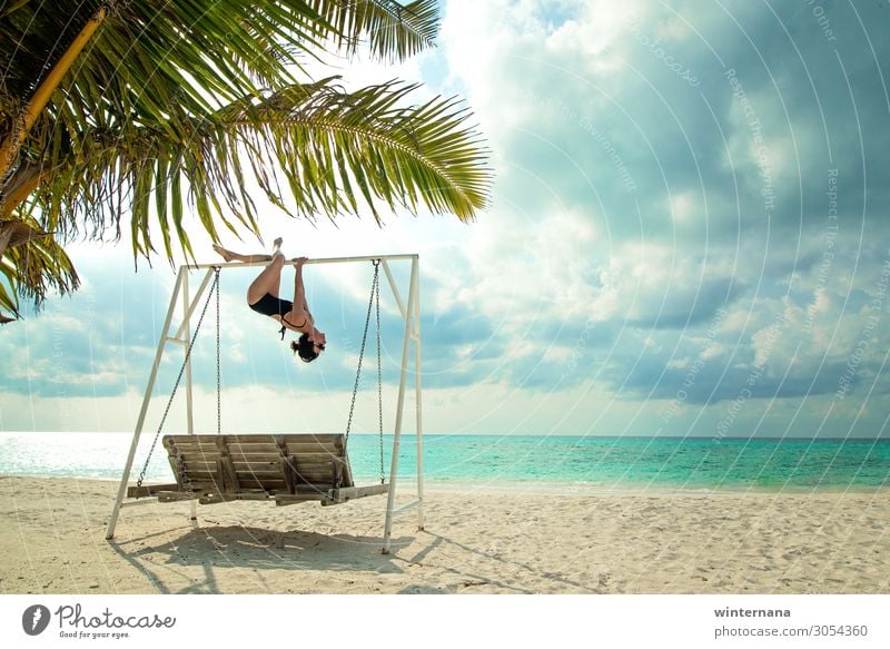 Hanging on a swing ocean Palm tree sky clouds Vacation & Travel maldives holiday sand beach swimsuit sunglasses