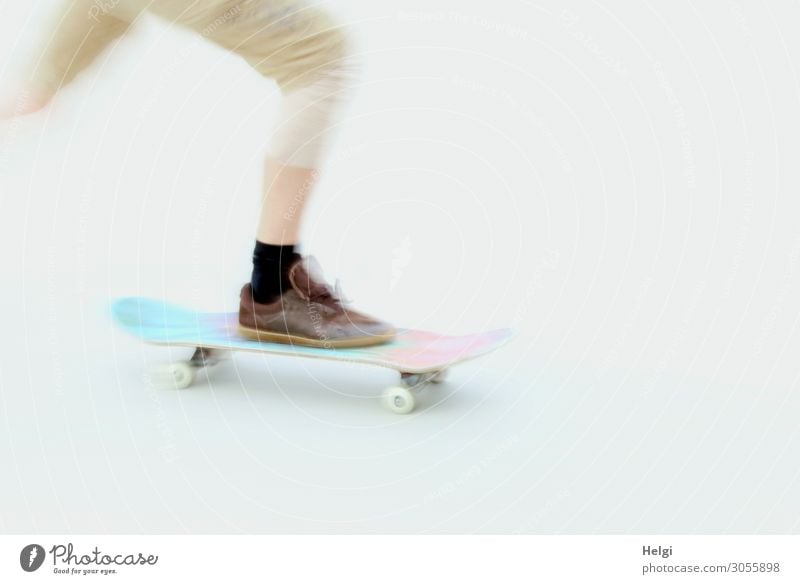 Detail of a scateboarder with motion blur Sports Skateboard Sports ground Human being Legs Feet 1 18 - 30 years Youth (Young adults) Adults Clothing Pants