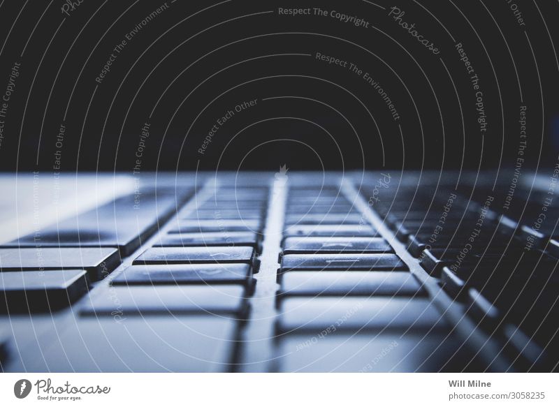 Macro Photo of a Laptop Keyboard type Typing Board Notebook Computer Technology Blue Macro (Extreme close-up) Near Close-up Dark Light Screen