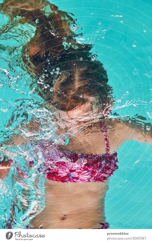 Young woman immersing herself in water Lifestyle Joy Happy Beautiful Body Athletic Wellness Well-being Relaxation Spa Swimming pool Swimming & Bathing