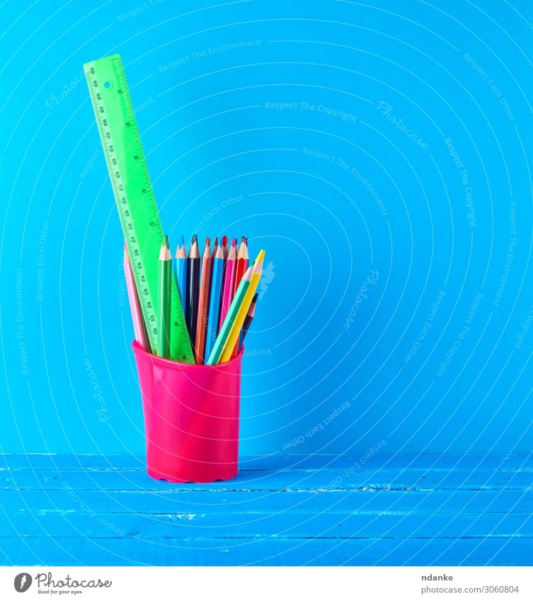 https://www.photocase.com/photos/3060804-blue-stationery-glass-with-multi-colored-wooden-pencils-photocase-stock-photo-large.jpeg