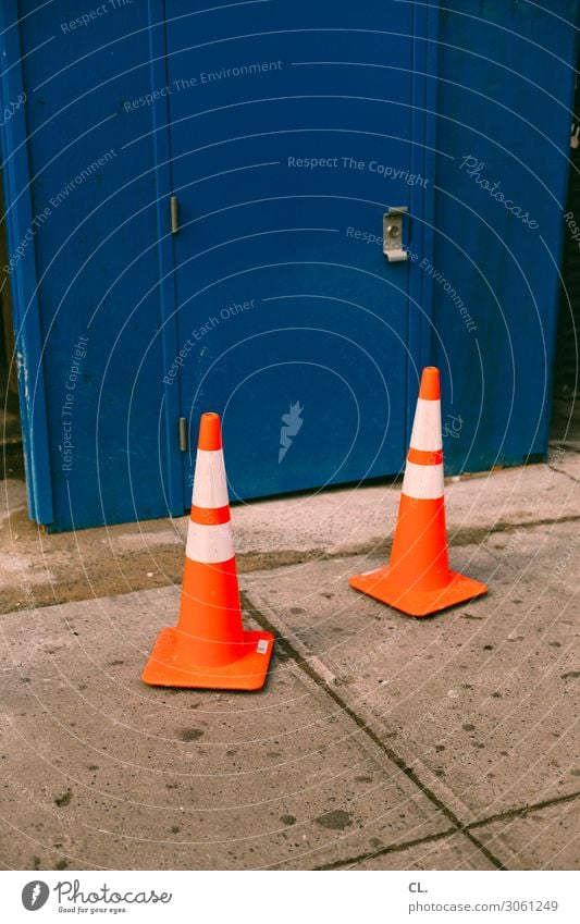 TWO HATS. Transport Traffic infrastructure Street Lanes & trails Road sign Traffic cone Container Signs and labeling Orange Arrangement Colour photo