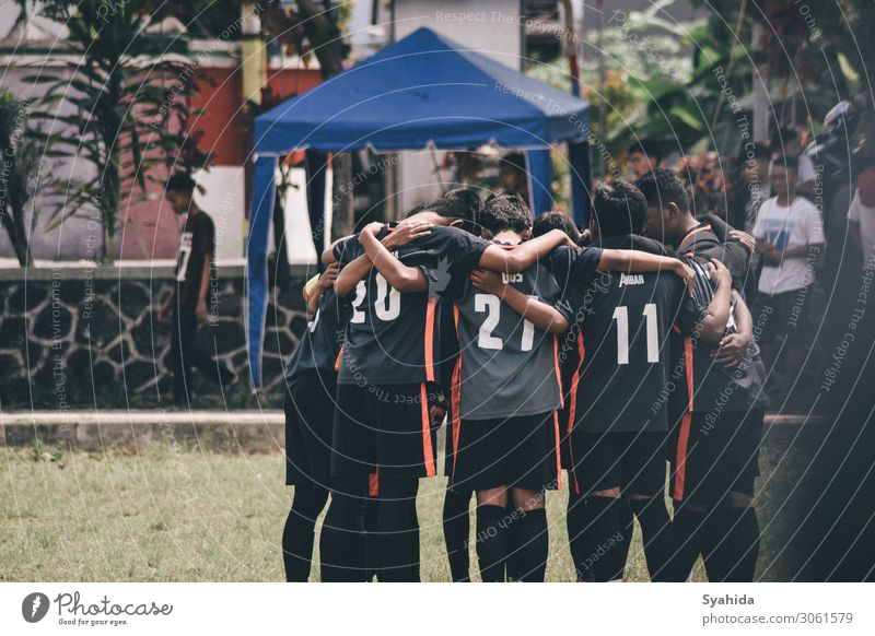 Praying Before Soccer Match Sports Stadium Group Emotions Self-confident Optimism Determination Friendship Together Colour photo Exterior shot Day Light