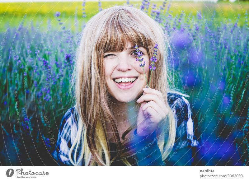 Young woman enjoying the day in a field of lavender Herbs and spices Lifestyle Beautiful Face Cosmetics Alternative medicine Medication Relaxation Human being