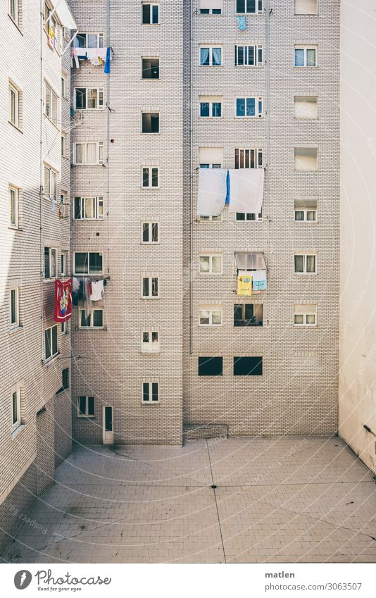 the White House Town Deserted House (Residential Structure) High-rise Wall (barrier) Wall (building) Facade Window Door Courtyard Bright Blue Yellow Red Laundry