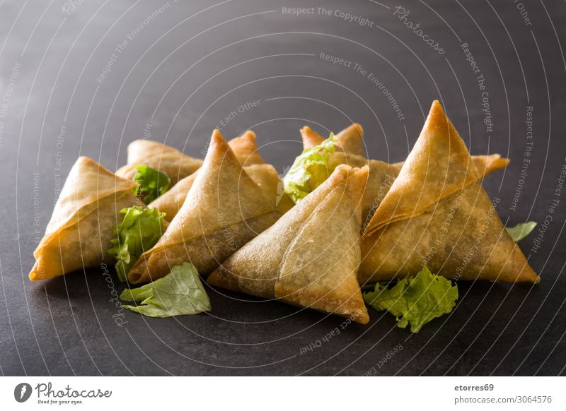 Samsa or samosas with meat and vegetables on black background. samsa Vegetarian diet Food Healthy Eating Food photograph Indian Tradition Meat Vegetable Beef
