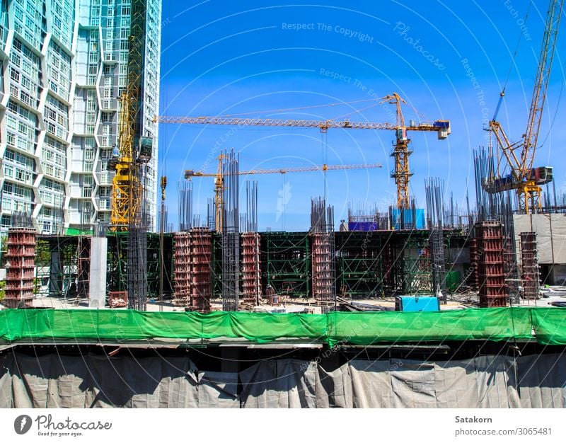 The under-construction building at site Work and employment Construction site Industry Sky Thailand Town Building Concrete Steel Blue crane Height engineering