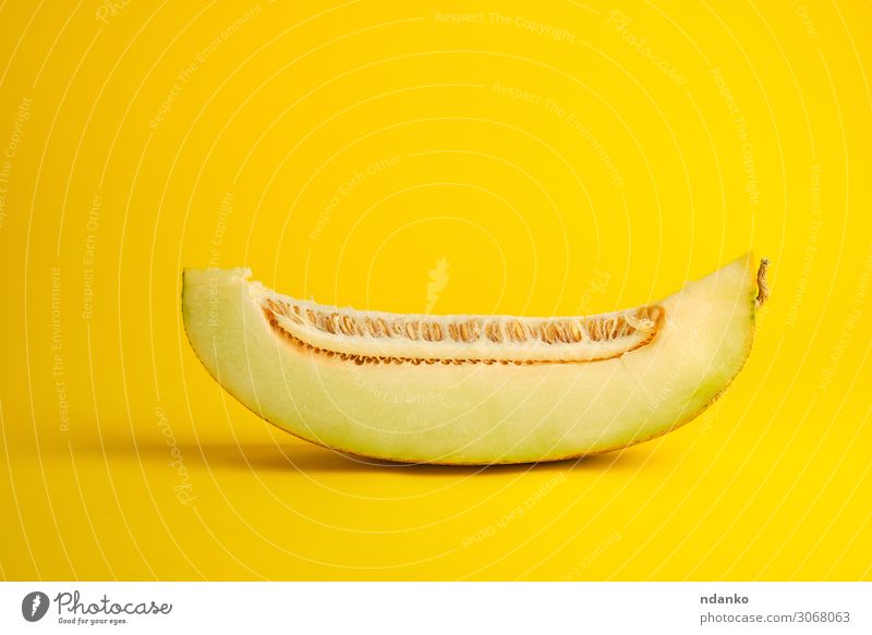 piece of ripe melon with seeds on a yellow background Vegetable Fruit Dessert Nutrition Vegetarian diet Diet Summer Nature Plant Eating Fresh Natural Juicy