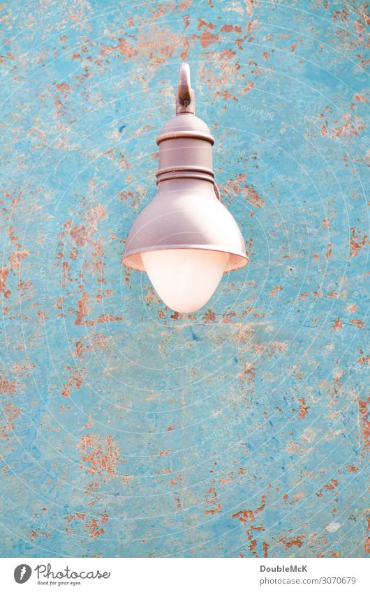 Beautiful lamp on rusty background Wall (barrier) Wall (building) Metal Rust Dirty Shabby Lamp Lantern Flake off Dappled Patch weather-beaten Derelict Worn out