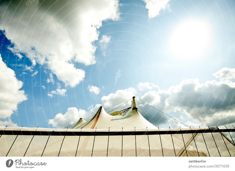 circus Sky Heaven Culture Deserted Summer Copy Space Shows Circus Circus tent Circus ring Fence Tent Clouds Worm's-eye view Sun Back-light Dazzle Flashy