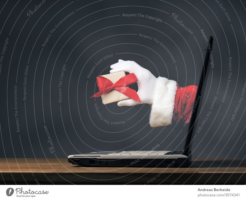 Hand of Santa with a gift box Winter Event Christmas & Advent Notebook Internet Human being Tradition Online Santa Claus Modern ecology Background picture
