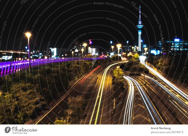 Long exposure of cars travelling in and out of Auckland, New Zealand abstract auckland background busy city cityscape driving illuminated light lights long