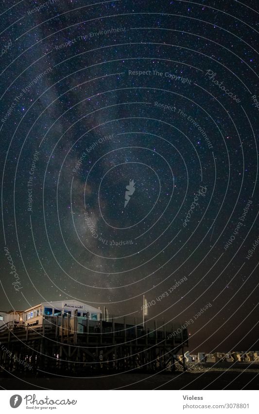 Pile dwellings on the beach of St. Peter Ording at night stars all Astrophotography Night Night sky Astronomy Long exposure Exterior shot Starry sky Universe