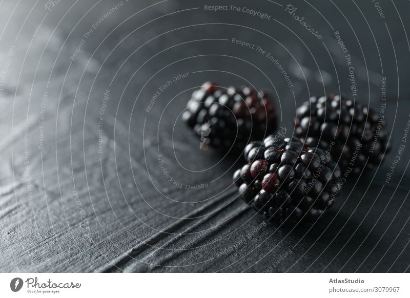 Blackberries on black cement background, closeup and space for text natural nature sweet abstract table summer vegetarian macro backdrop design ripe creative